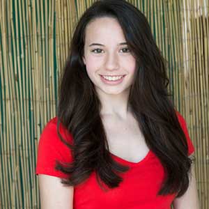 girl with long black hair wearing red shirt